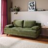 Global Wohnen Schlafsofa Carmona in Stoff grün mit schwarzen Metallfüßen im Wohnzimmer