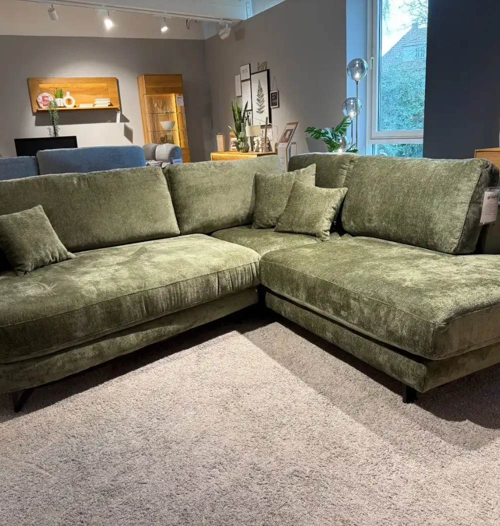 Ecksofa Natura Home Solenne, Vorderansicht mit losen Rückenkissen